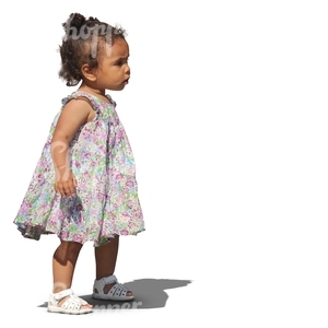 young african girl in a summer dress standing