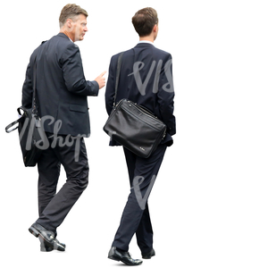 two businessmen in suits walking and talking