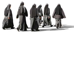 group of nuns walking on the street