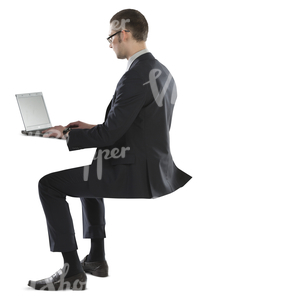 young businessman sitting and working with his laptop