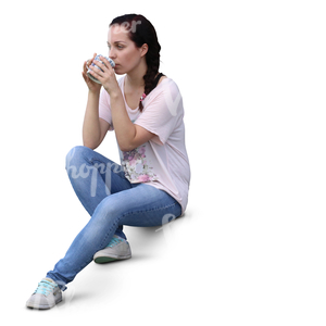 woman sitting on the stairs and drinking coffee