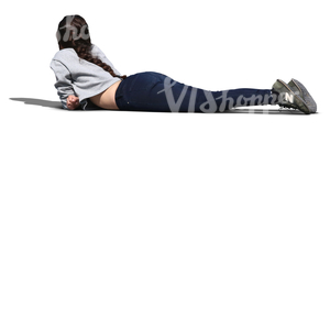 young woman lying on the ground