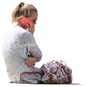 girl sitting and talking on the phone