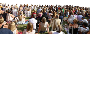 big group of people sitting on a grass on an outdoor event