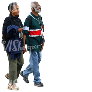 elderly black couple walking hand in hand