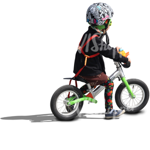 child wearing a helmet riding a likeabike