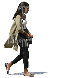 young african woman walking on the street