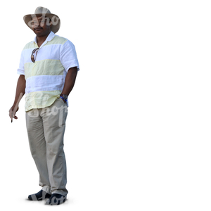 black man with a hat standing and smoking