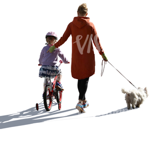 mother walking with her daughter who is riding a bike