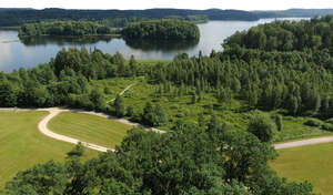 cut out bird eye view of a beautiful rural landscape with a lake