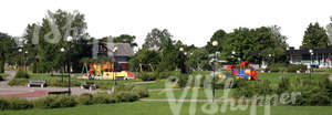 cut out view on a park with a house and playground