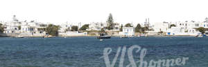 cut out background with white houses by the sea