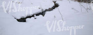 a small creek in winter