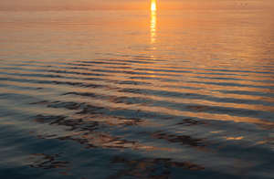 sea with sunset reflection