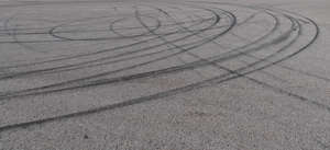 asphalt with many tyre tracks