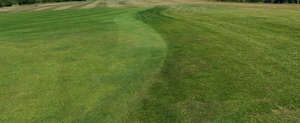 large field of mowed lawn seen from above