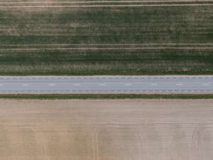 road between fields seen from above