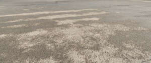 field of asphalt after the rain
