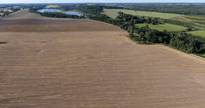 aerial view of a large field in countryside