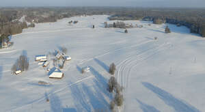 aerial view of a snowy rural landscape 