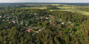 aerial view of a suburb by the sea