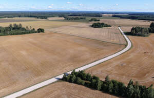 aerial view of an agricultural land with a road