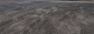 square of dark asphalt gravel