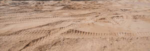 sand with tyre tracks