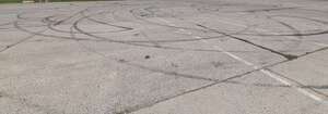 concrete square with dark tyre tracks