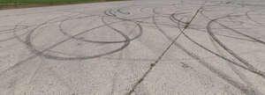 tarmac square with dark tyre tracks