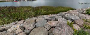 pile of rocks on the shore