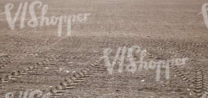 a field with tractor tracks