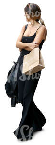 woman in a black outfit and carrying shopping bags