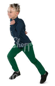 young boy running happily