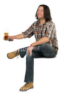 man sitting in a cafe and drinking beer