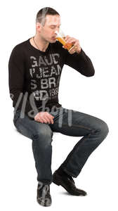 man sitting in a cafe and drinking beer