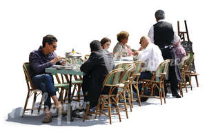 people sitting in a street cafe