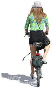 woman with a white hat riding a bicycle
