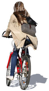 woman with long hair riding a bicycle