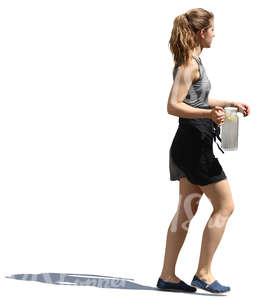 young waitress taking a can of water to the table