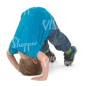 little boy doing a somersault