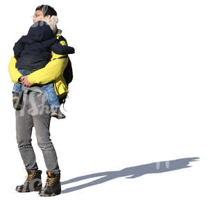 asian man standing and holding his daughter in his arms