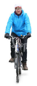 man in a blue jacket riding a bike