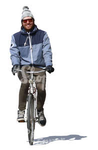 smiling man riding a bike