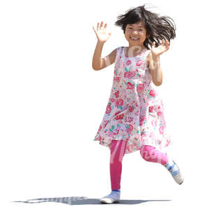 little asian girl in a pink dress running and laughing