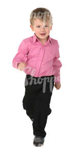 young boy in a pink shirt running