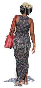 cut out african woman in a long dress walking