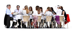 big group of people sitting in a cafe