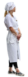 waitress in a white uniform standing