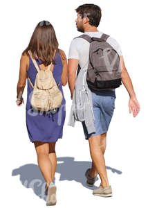 man and woman walking on a sunny day